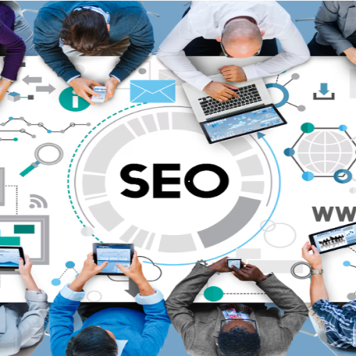 Digital marketing professional comparing SEO and Google Ads strategies on a laptop dashboard to improve website traffic, rankings, and lead generation.